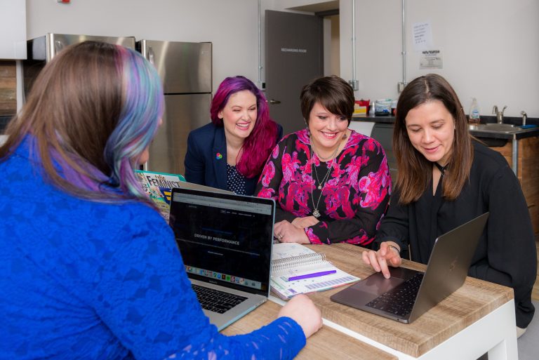 a group of women crowdsourcing